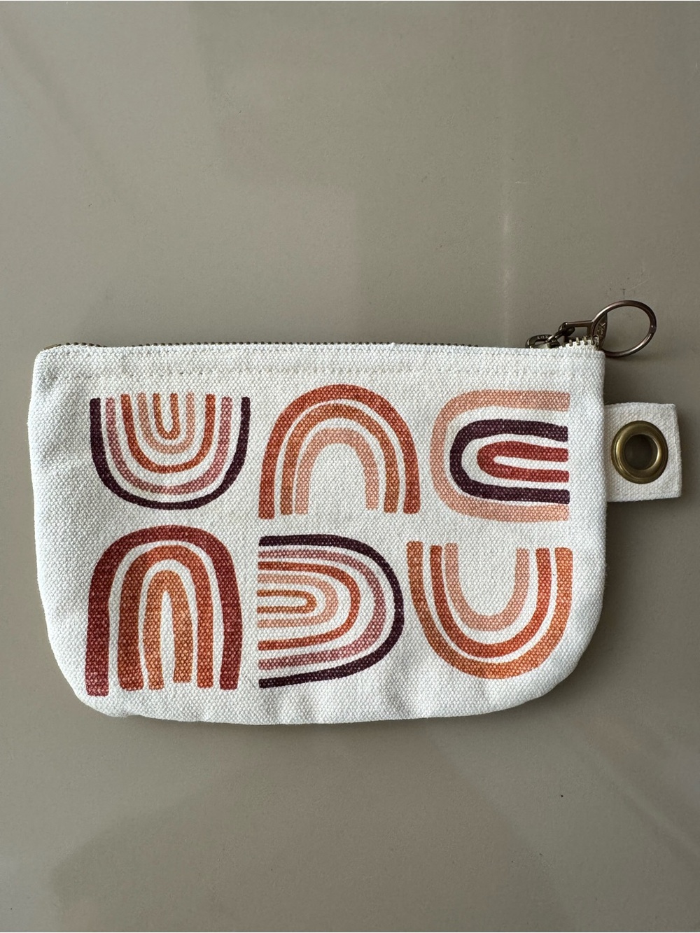 Danica Studio canvas zip pouch with terracotta rainbow screen-print design